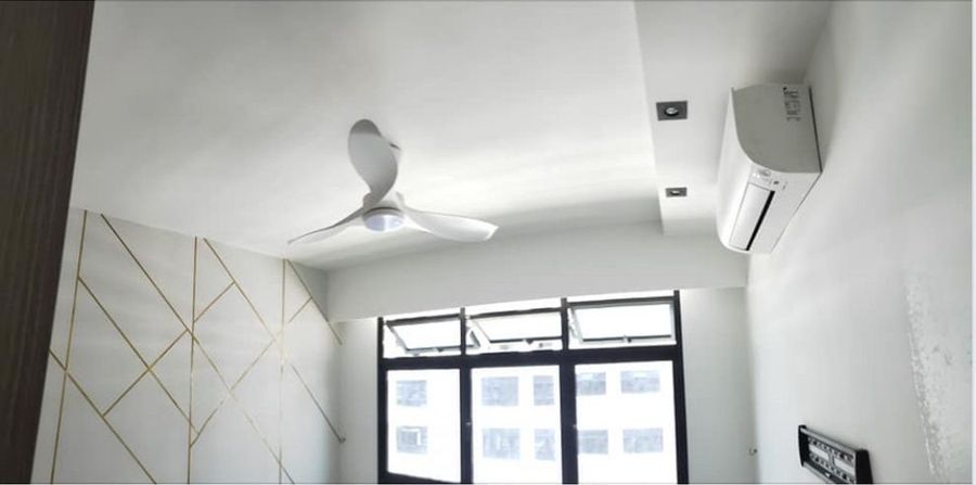 Freshly repainted master bedroom with ceiling fan and air-con